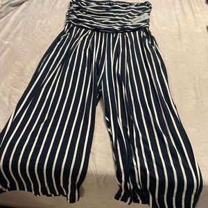 Knit pinstripe strapless jumpsuit.